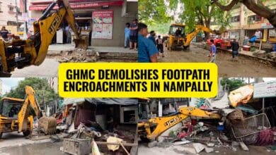 GHMC officials oversee the demolition of illegal encroachments on a footpath in Nampally's Ahmed Nagar division on Monday.