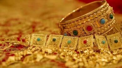 Gold prices surge to record high amid safe haven demand