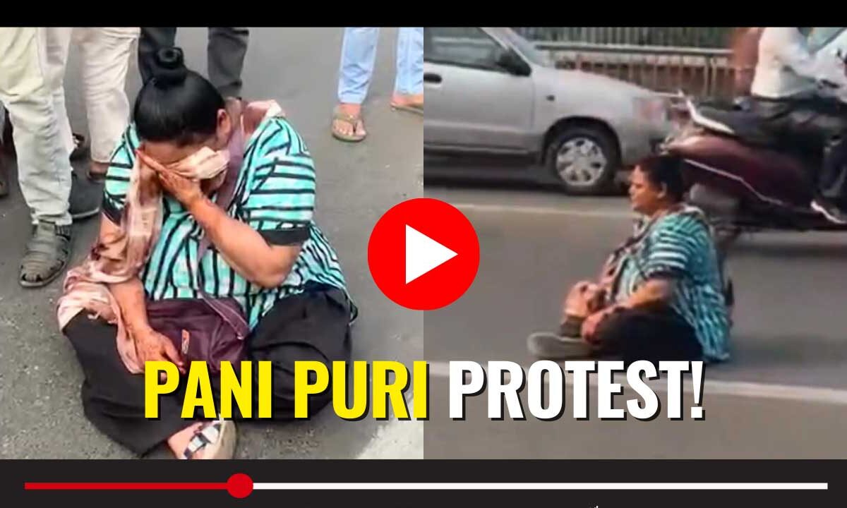 Vadodara police intervene as a woman stages a dramatic road protest over a pani puri dispute near Sursagar Lake.